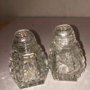 Elegant vintage pinwheel Crystal Salt and Pepper Shakers, glass tops, used